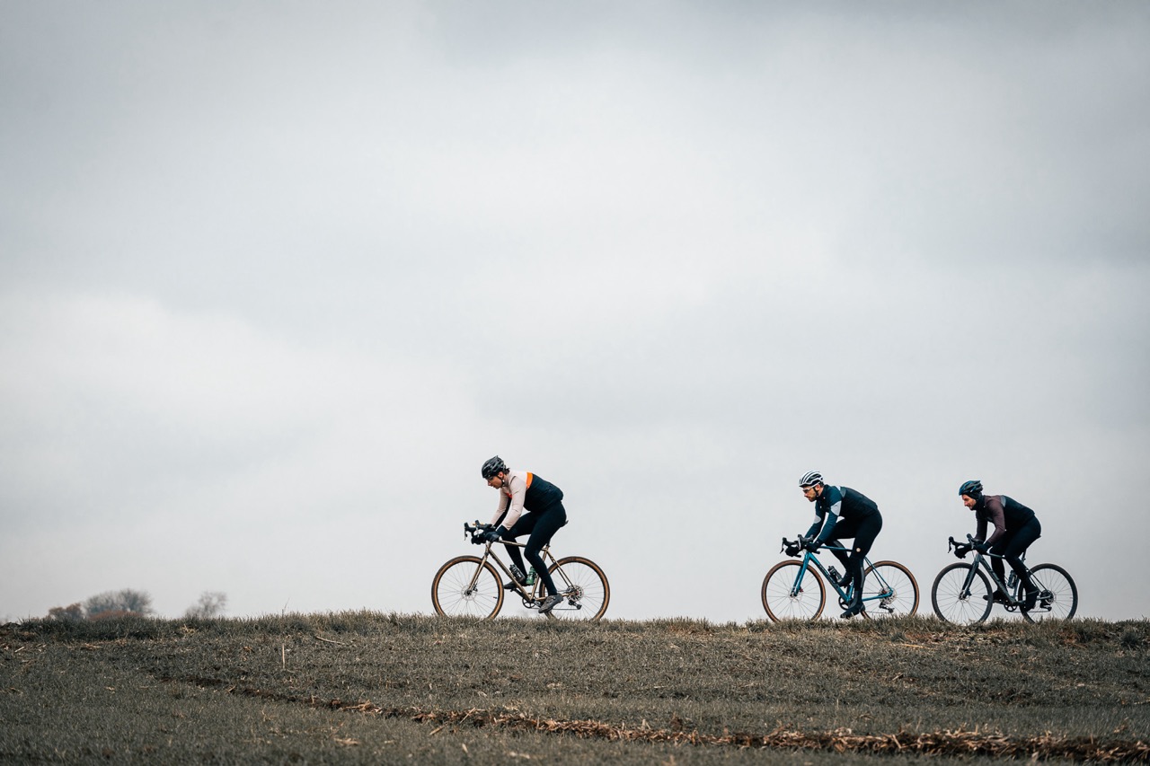 3 cyclists riding in chilly weather